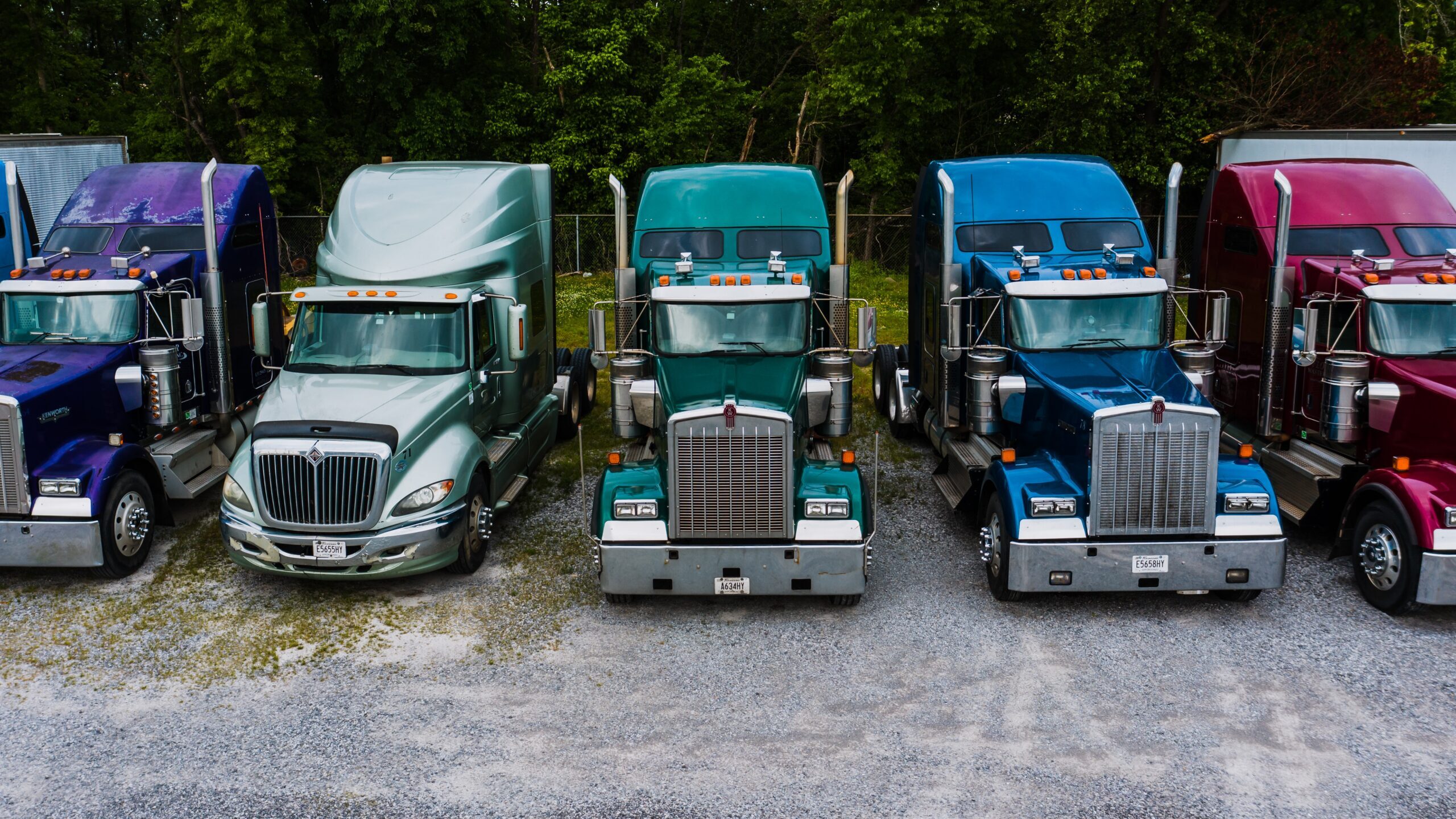AKAFS Trucking diverse fleet of colorful trucks